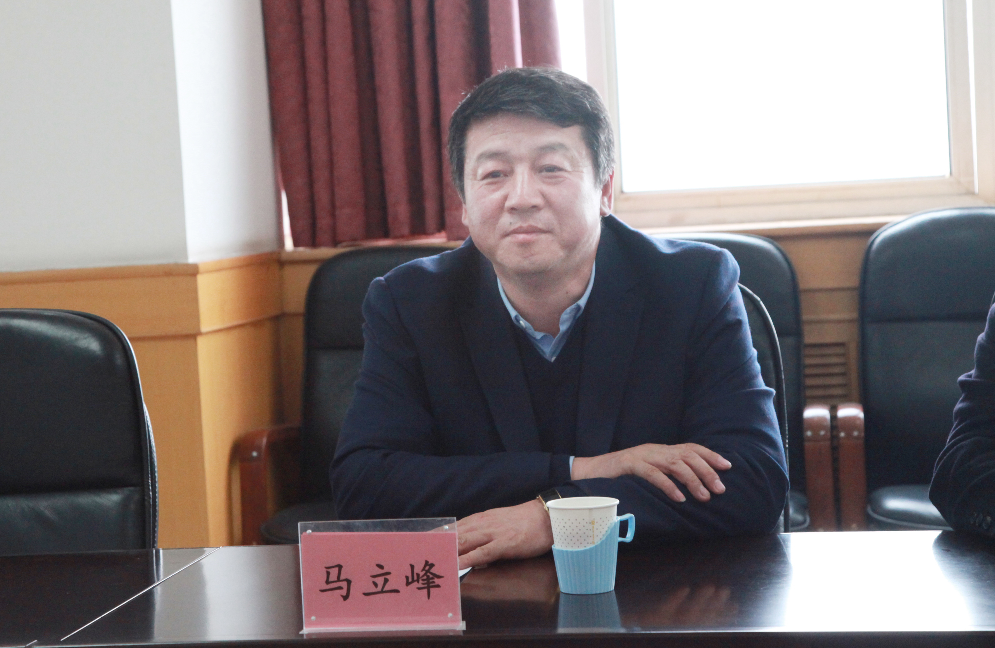 青龙县领导与学校领导交流帮扶工作